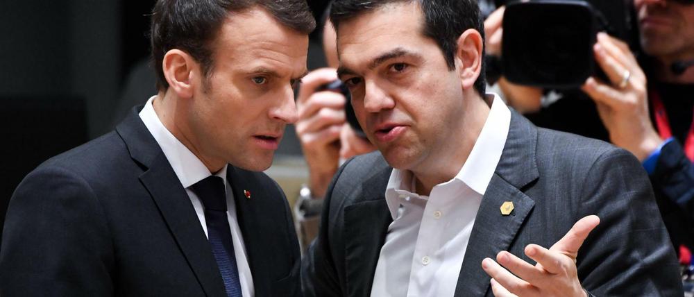 Frankreichs Präsident Emmanuel Macron (links) und der griechische Premier Alexis Tsipras beim EU-Gipfel in Brüssel.