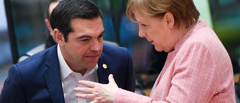 Der griechische Ministerpräsident Tsipras und Kanzlerin Merkel im vergangenen März in Brüssel.