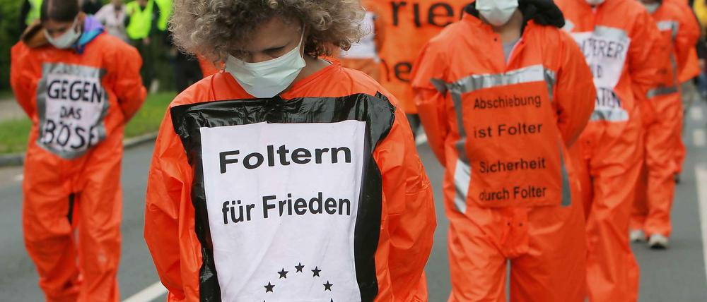 Proteste gegen Folter gab es rund um den Globus - hier in München. 