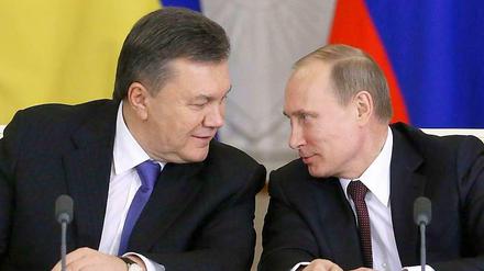 Einig. Wladimir Putin (r.) und Viktor Janukowitsch am Dienstag in Moskau.