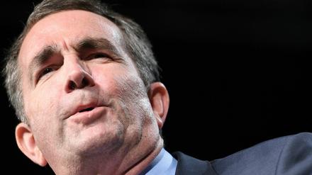 (FILES) In this file photo taken on October 19, 2017 Democratic Gubernatorial Candidate Ralph Northam speaks during a campaign rally in Richmond, Virginia. - How far do we go in holding politicians accountable for offensive behavior from their past?What if that behavior evoked the darkest chapters of American history, from slavery to segregation? (Photo by JIM WATSON / AFP) / TO GO WITH AFP STORY by Issam AHMED: "Racism and redemption: Virginia blackface row sparks national debate"
