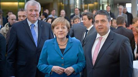 Die Gesichter der großen Koalition: Horst Seehofer (CSU), Angela Merkel (CDU), Sigmar Gabriel (SPD).