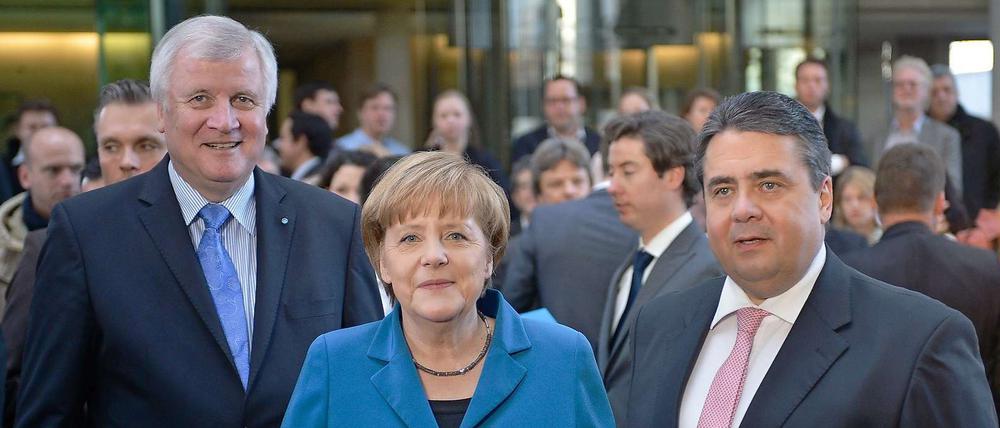 Die Gesichter der großen Koalition: Horst Seehofer (CSU), Angela Merkel (CDU), Sigmar Gabriel (SPD).