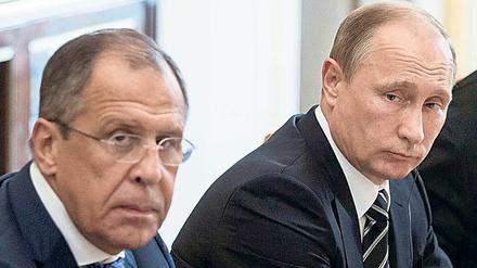 Der russische Präsident Wladimir Putin und der Außenminister Sergej Lawrow.