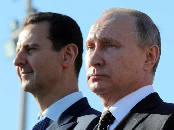 Russlands Präsident Wladimir Putin (r.) und sein Amtskollege Baschar al Assad wollen ganz Syrien unter Kontrolle bringen.