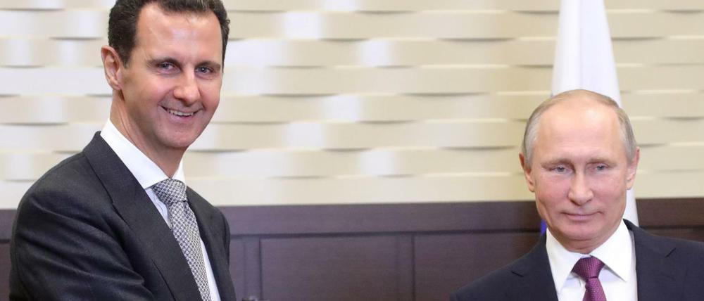 Zwei, die sich mögen: Baschar al-Assad und Wladimir Putin am Montag in Sotschi. 