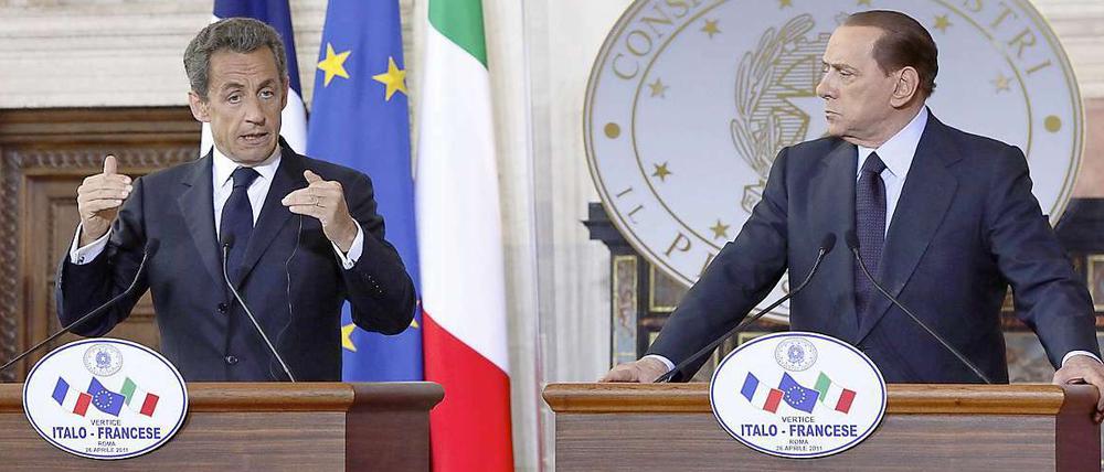 Frankreichs Präsident Nicolas Sarklozy und der italienische Ministerpräsident Silvio Berlusconi.