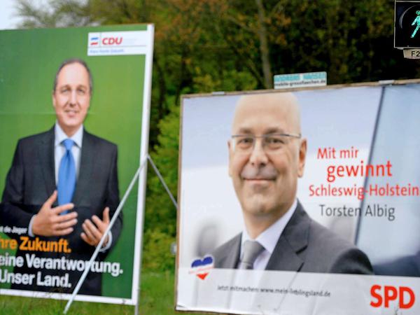 Die Spitzenkandidaten zur Landtagswahl in Schleswig-Holstein: Torsten Albig (SPD, rechts) und Jost de Jager (CDU, links).