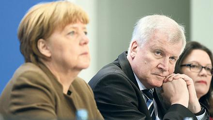 Bundeskanzlerin Angela Merkel (CDU) mit ihren Koalitionspartnern Horst Seehofer (CSU) und Andrea Nahles (SPD). 