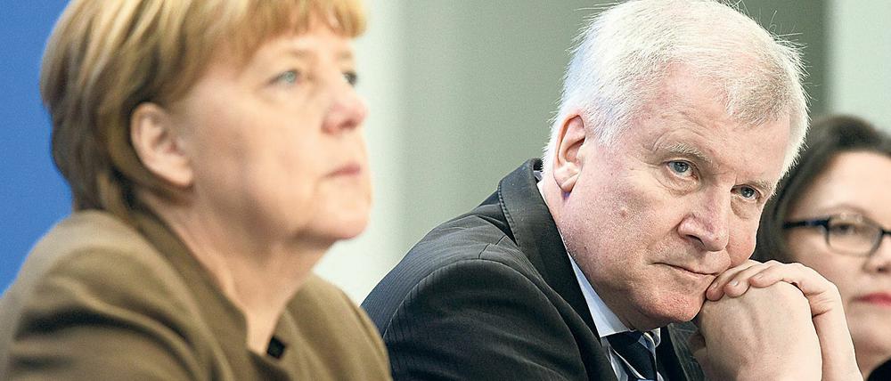 Bundeskanzlerin Angela Merkel (CDU) mit ihren Koalitionspartnern Horst Seehofer (CSU) und Andrea Nahles (SPD). 