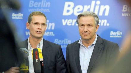 Bürgermeister Klaus Wowereit (r.) und SPD-Landeschef Michael Müller sind bereit für eine Koalition mit den Grünen.