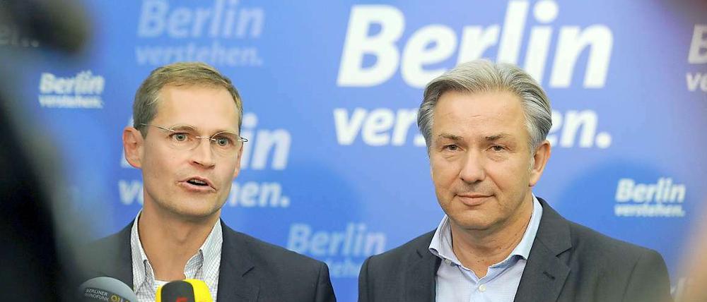 Bürgermeister Klaus Wowereit (r.) und SPD-Landeschef Michael Müller sind bereit für eine Koalition mit den Grünen.