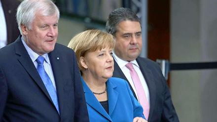 Die drei Parteichefs Seehofer, Merkel und Gabriel