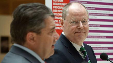 Peer Steinbrück und Sigmar Gabriel wollen mit einem Harmonie-Signal die SPD-Basis beruhigen.