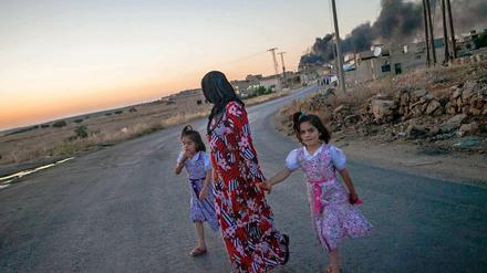 Flucht vor den Flammen. Viele Syrer haben ihre Häuser verloren.