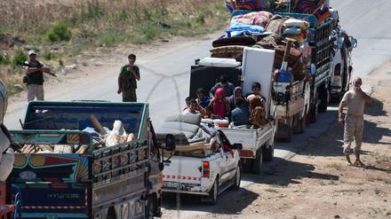 Syrer passieren einen Checkpoint in der Provinz Idlib, in der die letzten Assad-Gegner leben.