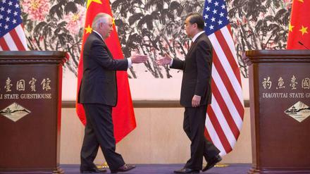 Nordkorea zwingt die USA und China zum Krisenmanagement: Die Außenminister Rex Tillerson (links) und Wang Yi.