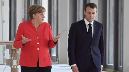 Das Verhältnis zwischen Merkel und Macron soll schwer beschädigt sein.