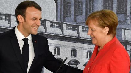Bundeskanzlerin Merkel und Frankreichs Präsident Macron bei der Pressekonferenz im Berliner Humboldt-Forum.
