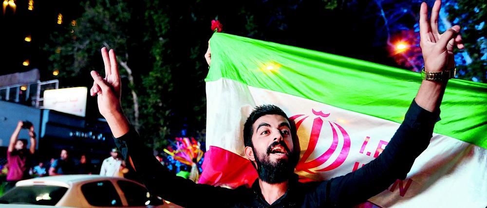 Grund zur Freude: Iraner feiern das Atom-Abkommen, das die Isolation ihres Landes beendet.