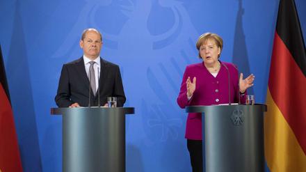 Bundeskanzlerin Angela Merkel (CDU) und Finanzminister Olaf Scholz (SPD). 