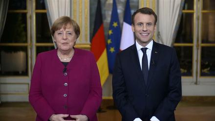 Kanzlerin Merkel und Frankreichs Staatschef Macron veröffentlichten am Sonntag eine gemeinsame Videobotschaft.  
