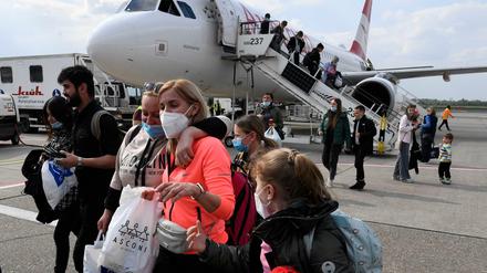 r FUkrainische Flüchtlinge, die aus der Republik Moldau per Flugzeug nach Deutschland kamen. Foto vom 5. Mai 2022.