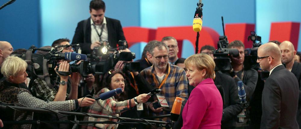 Bundeskanzlerin Angela Merkel und die Medien.