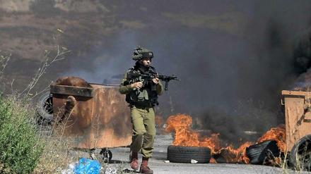 Feuerpause? Ein israelischer Soldat im Kampfgebiet. 