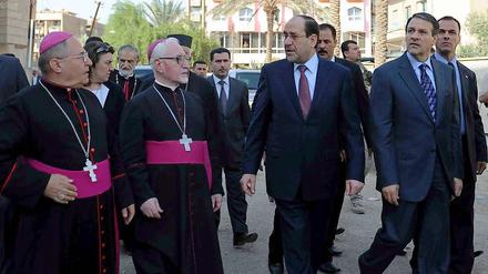 Shlimun Warduni, Premier Nuri al-Maliki und Sprecher Ali al-Dabagh (v.l.).
