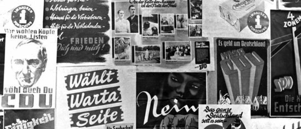 Und zwischendrin auch Seife: Eine Plakatwand zur Wahl 1949 in Düsseldorf.
