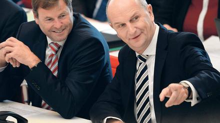 Regierende. Ministerpräsident Dietmar Woidke (SPD) und Christian Görke, Linke-Landeschef und weiterhin Finanzminister, auf der Regierungsbank im Landtag.