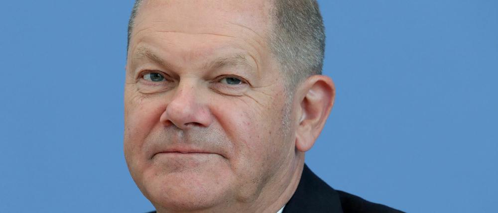 Olaf Scholz looks on during a press conference to present the tax estimate in Berlin, Germany, on May 14, 2020. (Photo by Michael Sohn / POOL / AFP)