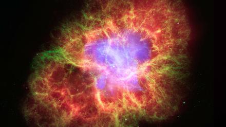 Unerklärliche Expansion. Anhand der Bewegungen von Supernovae – hier im Krebsnebel – können Astronomen auf die Ausdehnung des Universums schließen.