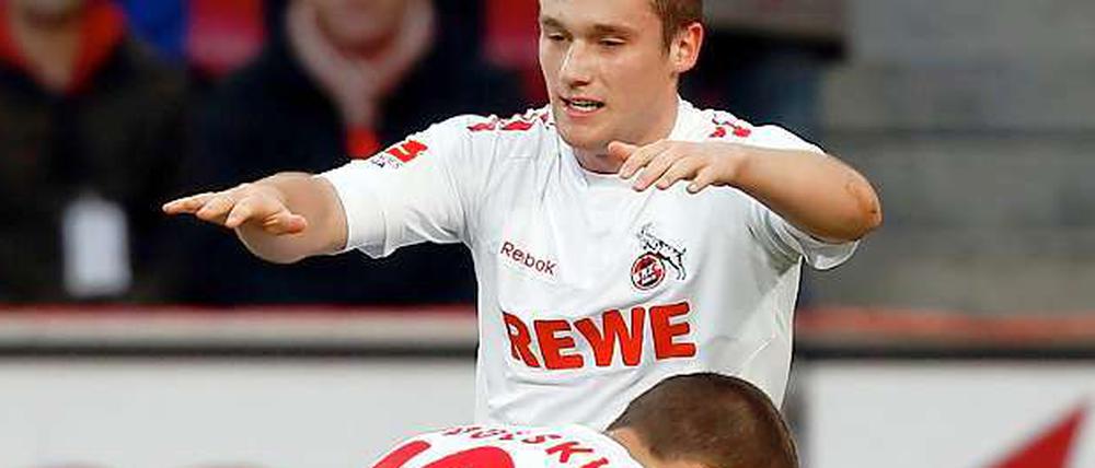 Doppelpack: Lukas Podolski (vorne) und Christian Clemens trafen je zweimal gegen Freiburg.
