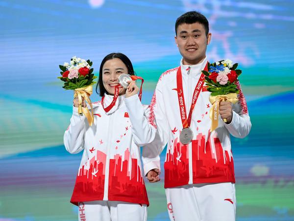 Zhu Daqing und ihr Guide Yan Hanhan gewannen Silber für China.