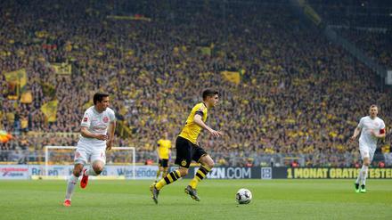 Dortmund (hier mit Christian Pulisic) mühte sich zum 3:2 gegen Düsseldorf.