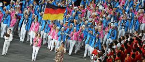 In London trug Hockey-Olympiasiegerin Natascha Keller die deutsche Fahne bei der Eröffnungsfeier. 