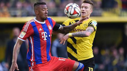 Topspiel: Marco Reus (r.) und Borussia Dortmund empfangen Jerome Boateng (li.) und den FC Bayern, hier beim letzten Liga-Aufeinandertreffen im April.