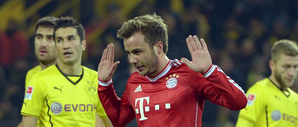 Mario Götze trifft für Bayern - und entschuldigt sich, weil er es gegen seinen ehemaligen Borussia Dortmund getan hatte.