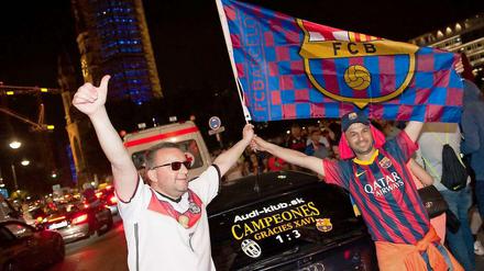 Gemeinsam und friedlich: Fußball-Fans feiern nach dem Champions-League-Finale gemeinsam am Breitscheidplatz.