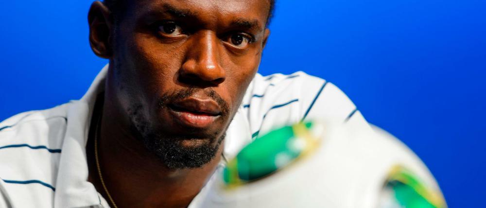 Ball im Blick. Usain Bolt, Sprintkönig aus Jamaika. 