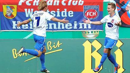 Sie schafften die Sensation: Marc Schnatterer (l.) und Christian Sauter schossen Werder Bremen aus dem DFB-Pokal.