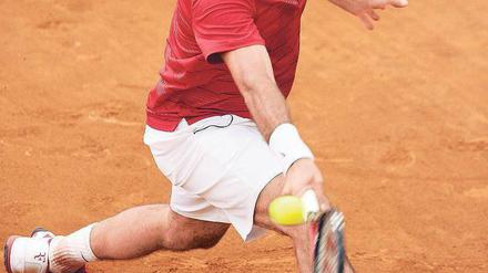 Spuren im Sand. Roger Federer kann heute seinen 17. Grand-Slam-Titel holen. Foto: AFP