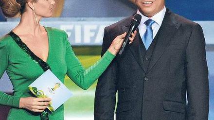 Suchbild. Welche der beiden Personen ist der frühere Fußballstar Ronaldo? Foto: AFP