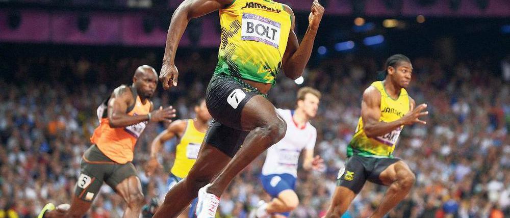 Nicht zu halten. Usain Bolt lag schon in der Kurve fast uneinholbar in Führung. Foto: dpa