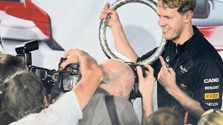 Der Weltmeister dreht wieder am großen Rad. Sebastian Vettel gibt auf der Zielgeraden der Saison noch einmal Gas. Foto: AFP