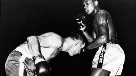 Auch der Größte war mal Amateur. Muhammad Ali (r.) bei einem Kampf im Jahr 1960, als er noch den Namen Cassius Clay trug. Foto: AP