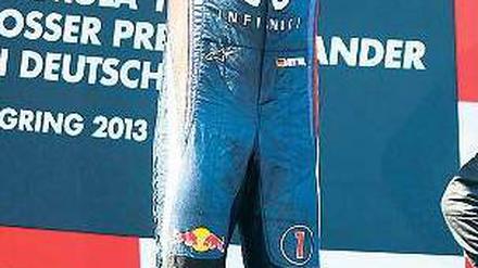 Neues Hochgefühl. Sebastian Vettel konnte trotz einiger Widrigkeiten zum ersten Mal das Rennen auf dem Nürburgring gewinnen. Foto: Reuters