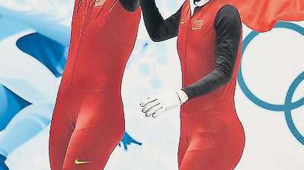 Alles auf Rot. Die Chinesin Wang Meng (links) gewann schon 2010 Gold – auch diesmal ist sie wieder Favoritin. 